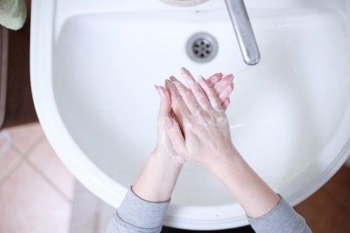 Rinsing with soap and water