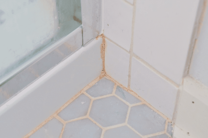 Why Are There Orange Stains In My Shower?